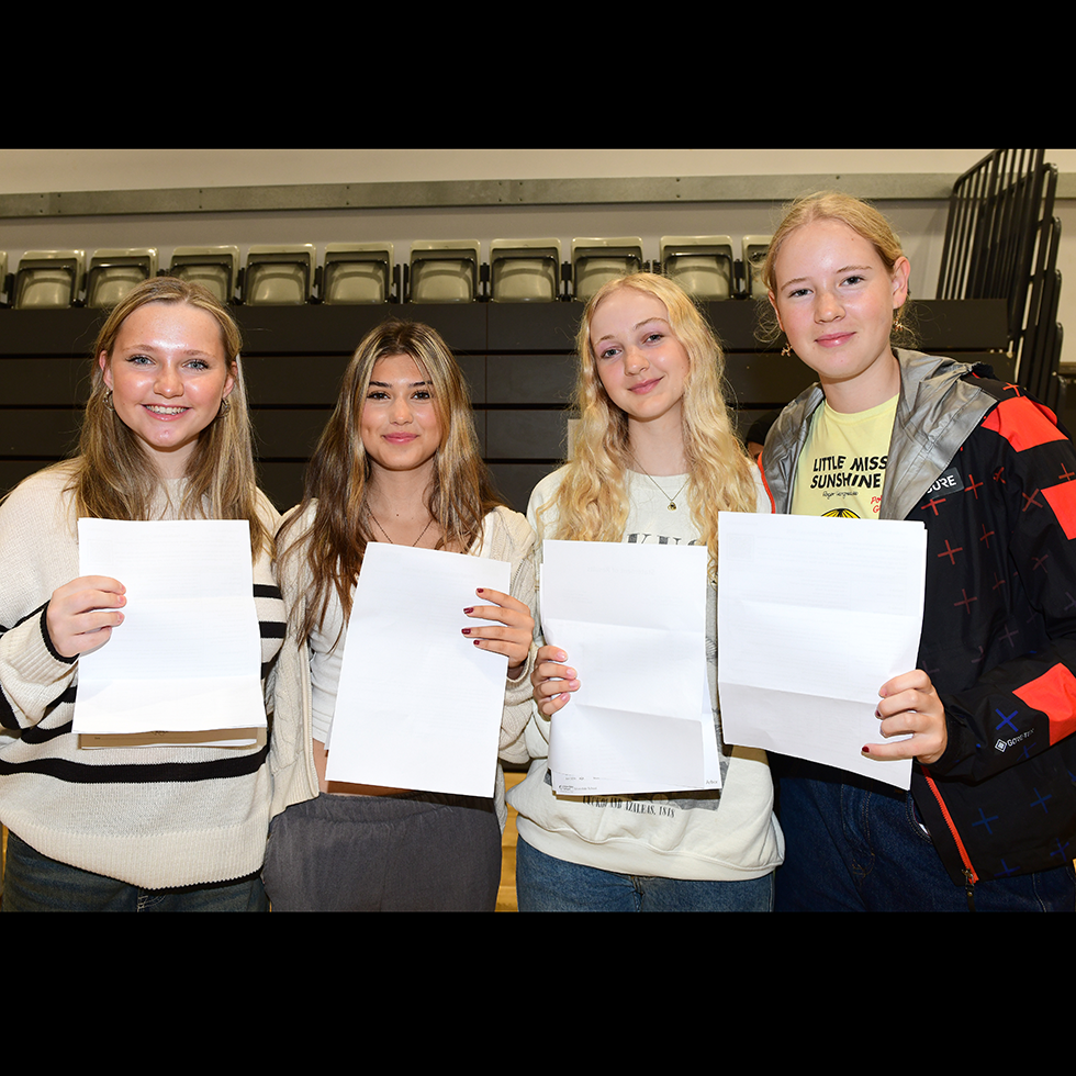 Image of students receiving exam results