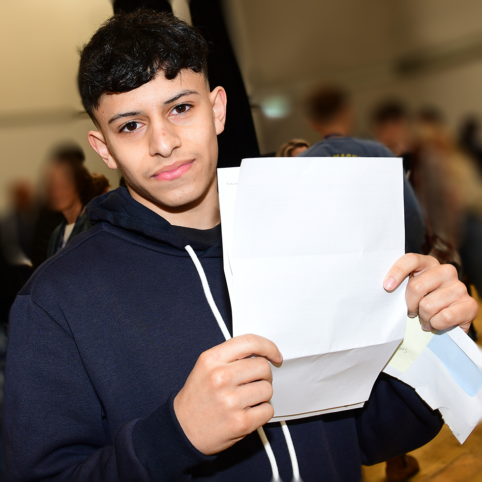 Image of students receiving exam results